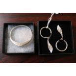 Pair of Silver Leaf design drop earrings and a Silver Bangle 43g total weight