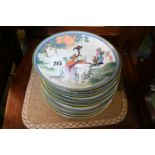 Collection of Oriental design collectors plates and a wooden plate rack