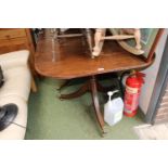 Regency Style table on brass casters