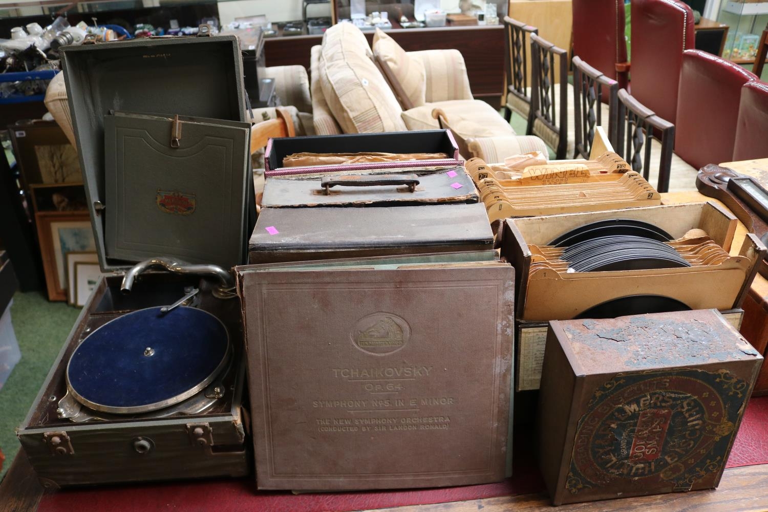 Collection of assorted Records and a Meritone portable record player