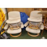 Pair of Stressless style cream Leather Armchairs with matching stools