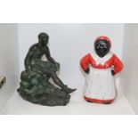 Bronze figure of male Nude and a Cast Iron Figural Novelty Moneybox