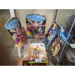 2 Carded Star Trek Next Generation figures, Space Precinct figure, Robotech figure and 2 Video Games