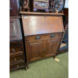 Arts & Crafts Oak Fall front Bureau with single drawer and cupboard base