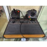 Atari 2600 Woody Video Computer System with 2 Joysticks