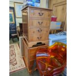 Pair of Yew Leather topped filing cabinets with brass drop handles on bracket feet
