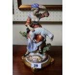 Good Quality European figurine of a shepherdess with Gilt base, Cross swords mark to base. 24cm in