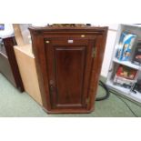 Georgian Oak panelled corner cabinet with open brass hinges