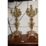 Pair of French Brass 4 Branch Candlesticks mounted on Onyx Bases with outstretched foliate decorated