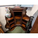 Victorian Mahogany Corner Cabinet with glazed cabinet and shaped base with turned finials