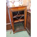 Edwardian walnut glass fronted music cabinet on bracket feet