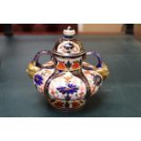 Royal Crown Derby Old Imari pattern two handled vase with lid. Puce mark to base. 13cm in Height