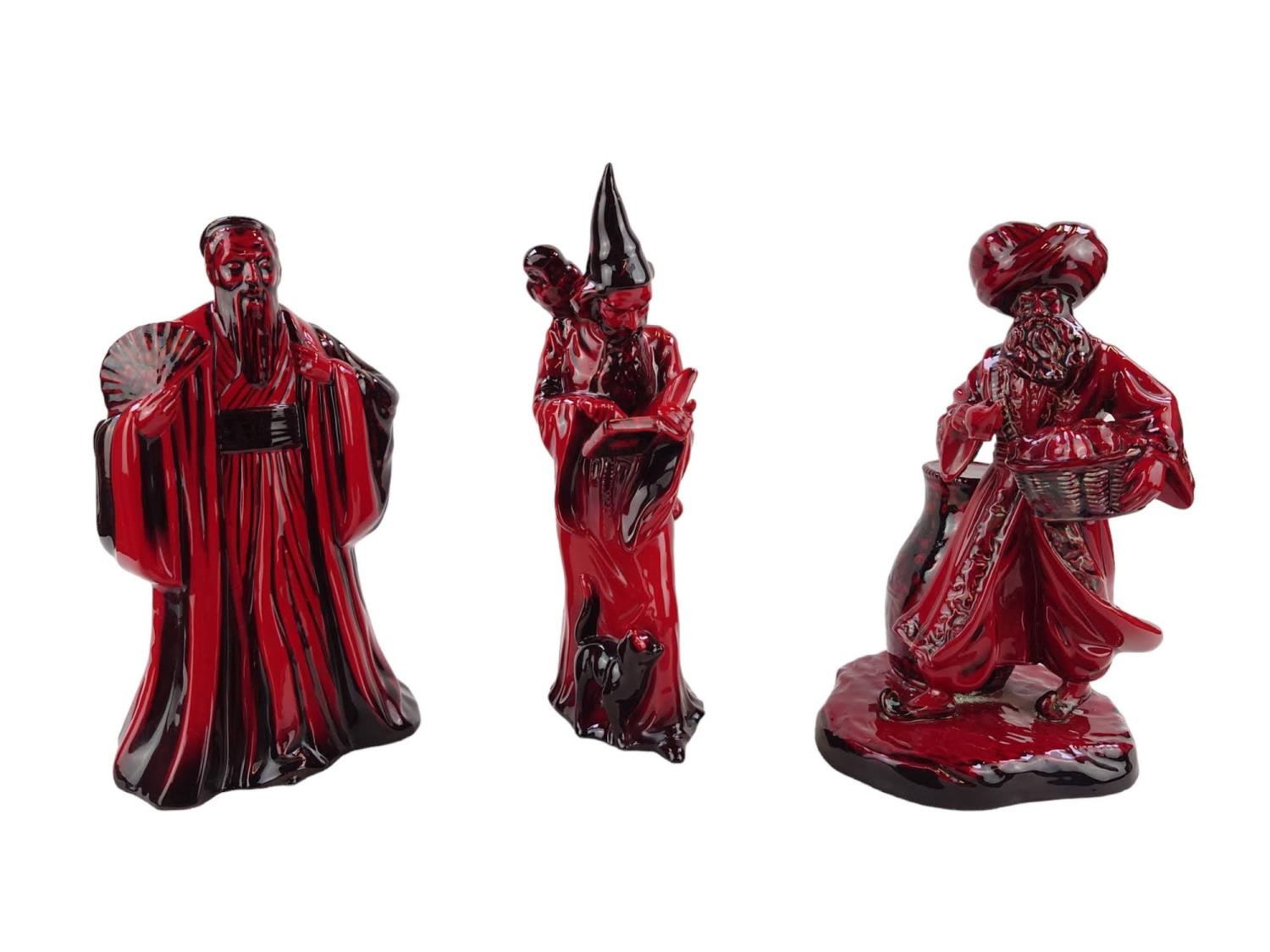 Royal Doulton Flambé figurines 'The Wizard' HN 3121, 'The Carpet Seller' HN 2776 & 'Confucius' HN