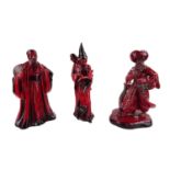 Royal Doulton Flambé figurines 'The Wizard' HN 3121, 'The Carpet Seller' HN 2776 & 'Confucius' HN