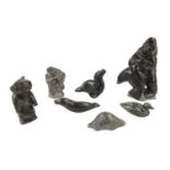 Collection of Seven Inuit stone carvings. Canada Eskimo Art Man with Seal dated 1979 numbered 109284