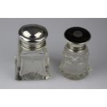 Two Silver Topped Cut Glass Dressing Table Bottles. Fluted shaped glass with silver top and original