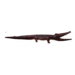 Interesting Large Hardwood Crocodile with glass bead eyes and bone teeth. 135cm in Length