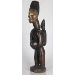 A Yombe figure with child 65cm high