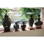 Collection of 3 Bronze Archaic style lamp bases and a Pair of lidded Bronze Archaic style vases