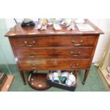 Edwardian Mahogany chest of 3 drawers with brass drop handles on tapering legs