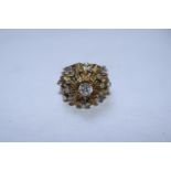 Ladies 14ct Gold Tested Diamond Cluster ring with 0.45ct Claw set Diamond surrounded in Claw set
