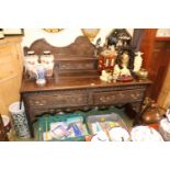 19thC Heavily Carved Dresser with drawer back and 2 large drawers with brass handles over straight