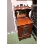 Late 19thC Coal Purdonium with carved panelled front and mirror back