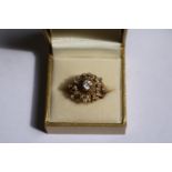 Ladies 14ct Gold Tested Diamond Cluster ring with 0.45ct Claw set Diamond surrounded in Claw set