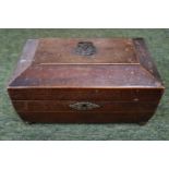 Georgian mahogany Tea Caddy with brass applied fittings supported on bun feet