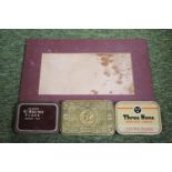 Piece of 1945 Reichstag curtain, 1914 Princess Mary Tobacco tin and 2 other (4)