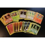 Quantity of Pokémon playing cards to include Metapot, Vulpix, Weedle, Energy etc