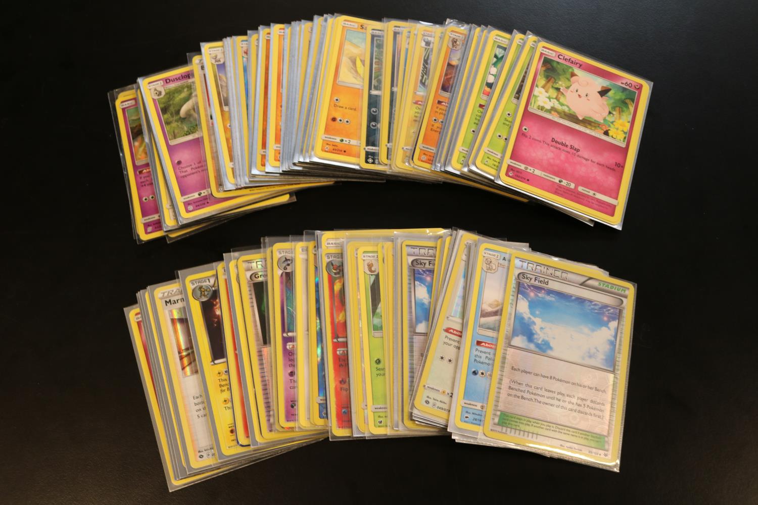 Quantity of Pokémon playing cards to include Azumarill, Houndoom Ex, Gyarados, Entei etc
