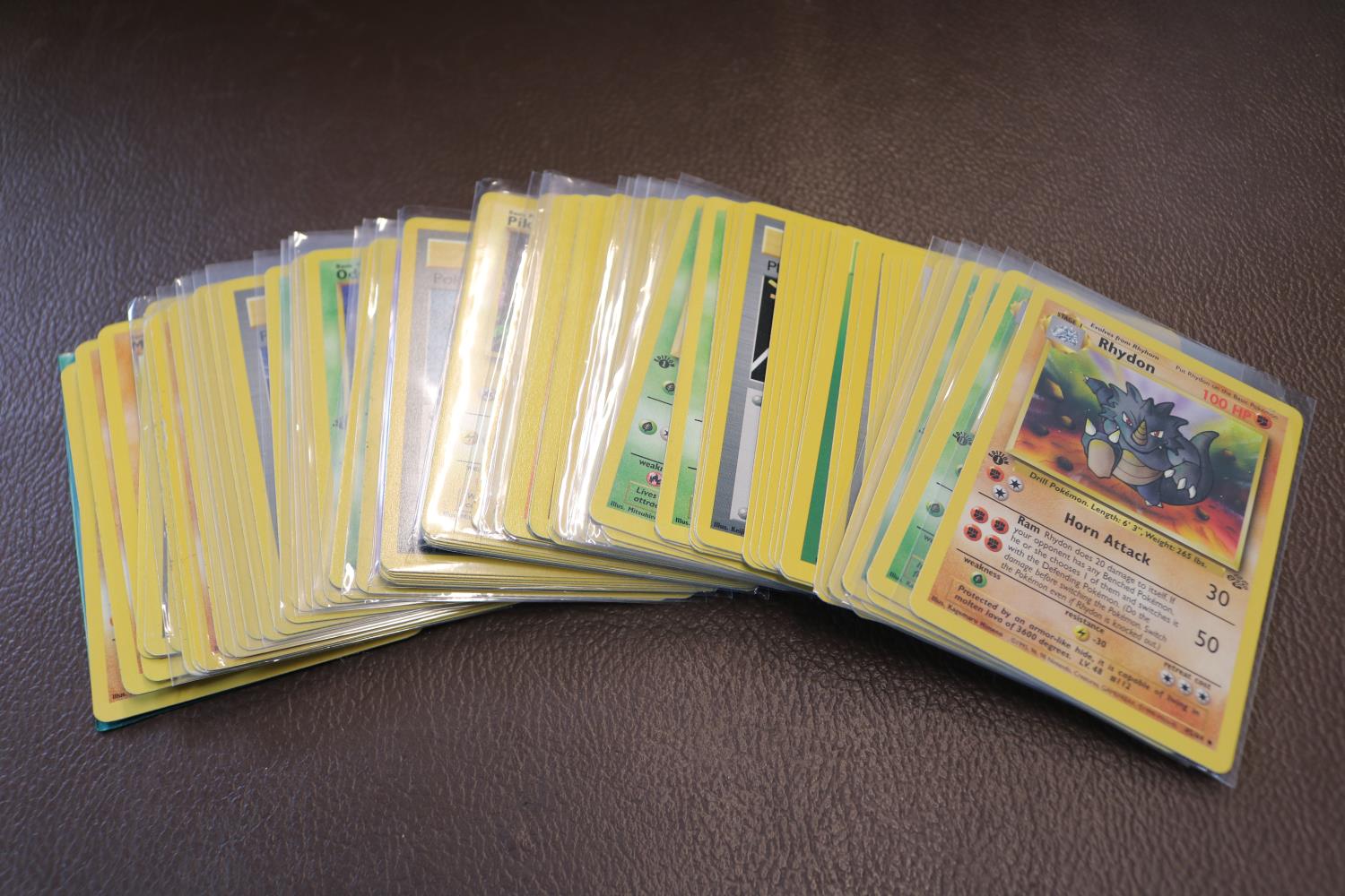 Quantity of Pokémon playing cards to include Tentacool, Magnemite, Abra, Gloom etc