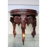 Indian Hardwood carved table with elephant head supports. 28cm in Height