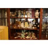 3 Shelves of assorted European and English China to include Pair of Figural bookends, Vases,