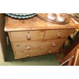 Stripped Pine Chest of 2 over 2 Drawers with turned handles and feet