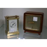 Brass Carriage clock and a Elliott Walnut cased clock