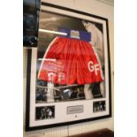 George Foreman signed boxing trunks Red, White & Blue. COA to Reverse. 78 x 99cm total size