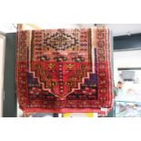 Small Persian Red ground rug