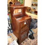 Late 19thC Mahogany Music Cabinet with mirrored back Glass fronted rack and drawer with carved panel