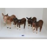 Collection of 4 Beswick Donkeys