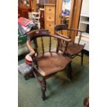 19thC Elm Smokers Bow Elbow chair with turned supports and shaped seat and a Later Elbow chair