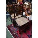 Pair of Oak Country chairs with rush seats