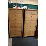 Pair of Oak Seven Drawer Chests with turned handles