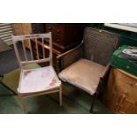 Painted stick back chair and a Upholstered Elbow chair with caned sides