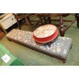 Victorian upholstered long gout stool on turned supports and a Circular upholstered gout stool