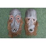 Pair of African Tribal Masks with Bovine Teeth and String Beards. 46cm in Length