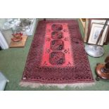 Red Ground Turkish Rug with tassel ends 217cm in Length