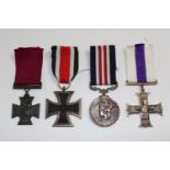 Collection of Reproduction Medals to include Military Cross, 1939 Iron Cross, Victoria Cross and a