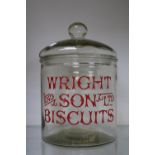 Large Glass lidded Wright and Son Ltd Biscuits jar. 26cm in Height